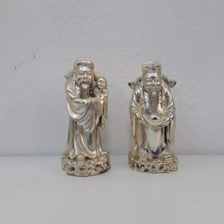(CK07176) Two Resin Figurines.12cm High.10.00 euros.